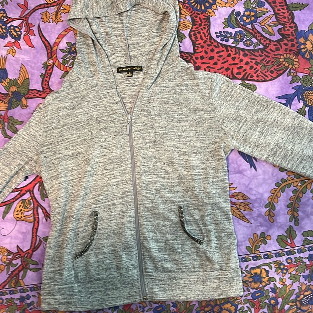 Light weight cardigan with rhinestone pockets and hoodie.